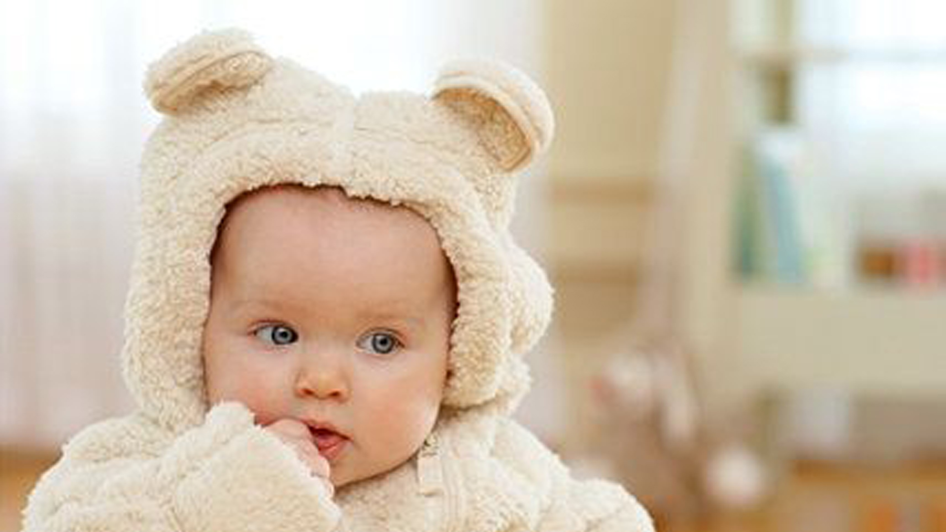 Cute Baby Is Wearing Fleece Costume Sitting In Blur Wallpaper 2K Cute