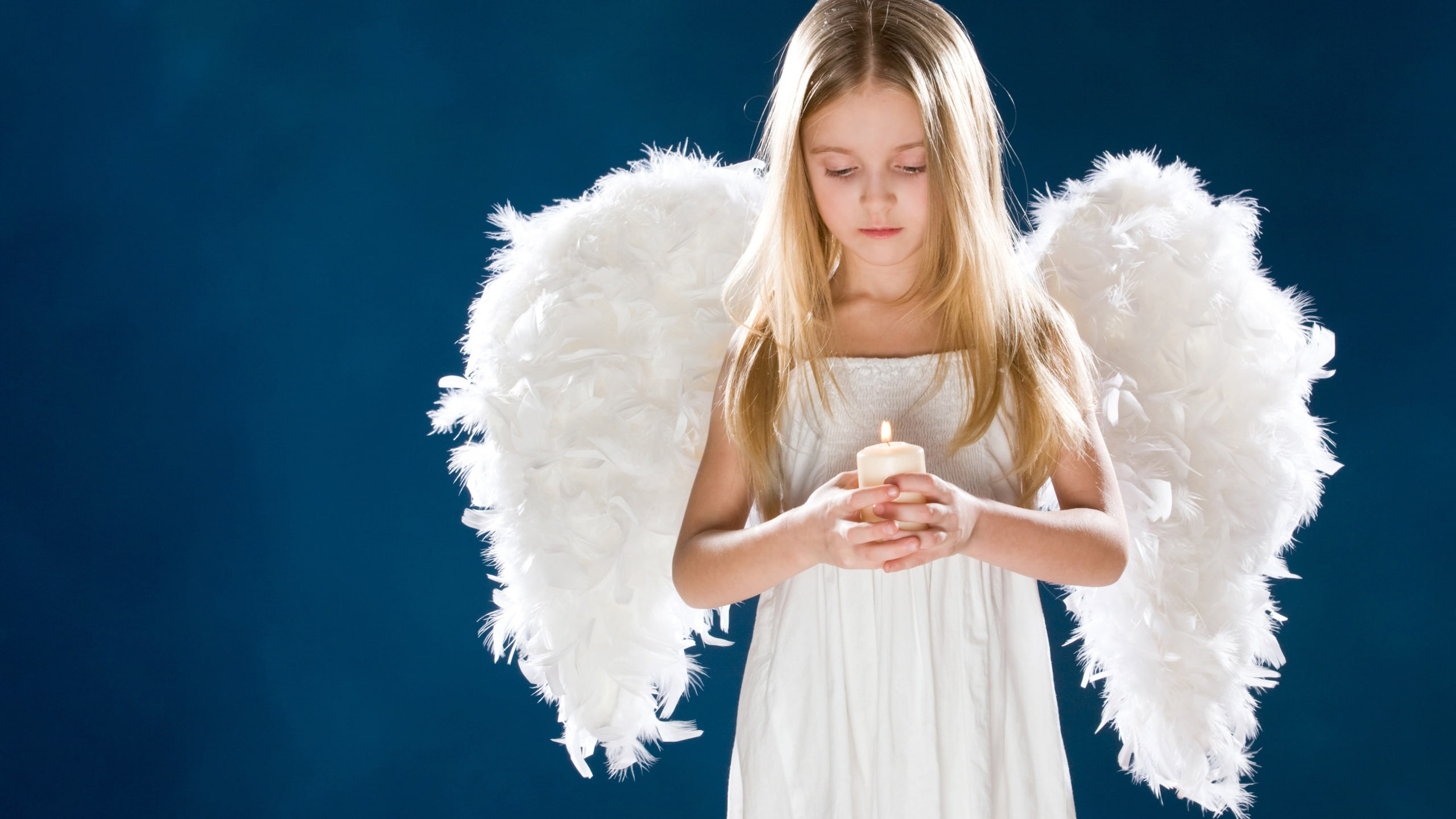 Cute Girl With Wings Is Holding Candle With Hands Wearing White Dress In Blue Wallpaper 2K Cute