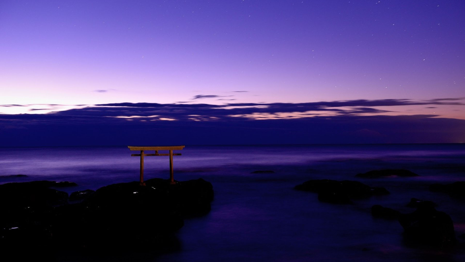 Purple Cloudy Sky Above Body Of Water And Wooden Bench On Rock 2K Nature