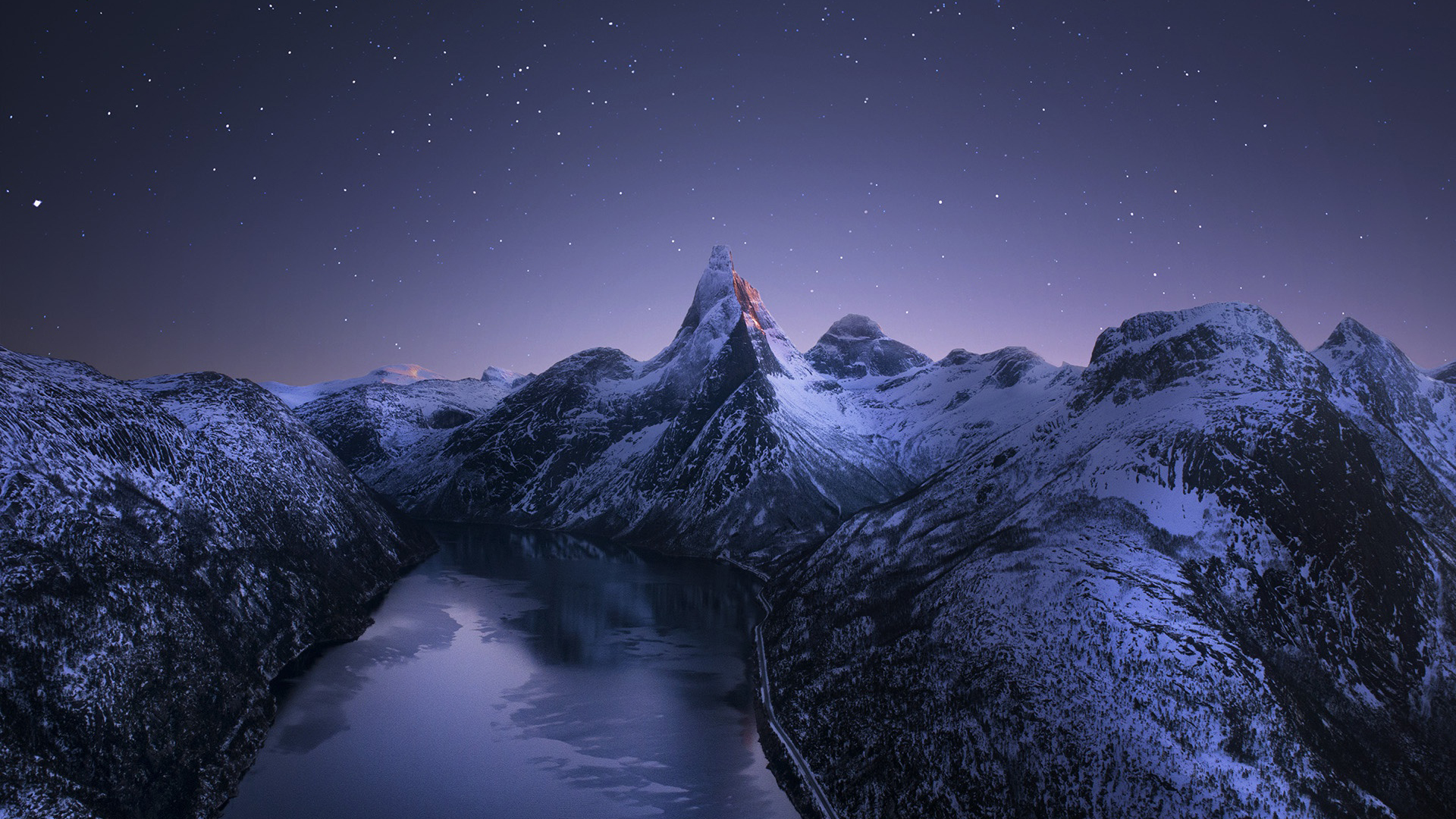 Norway Mountain With Snow And Peak Pond Under Starry Sky During Nighttime 2K Winter