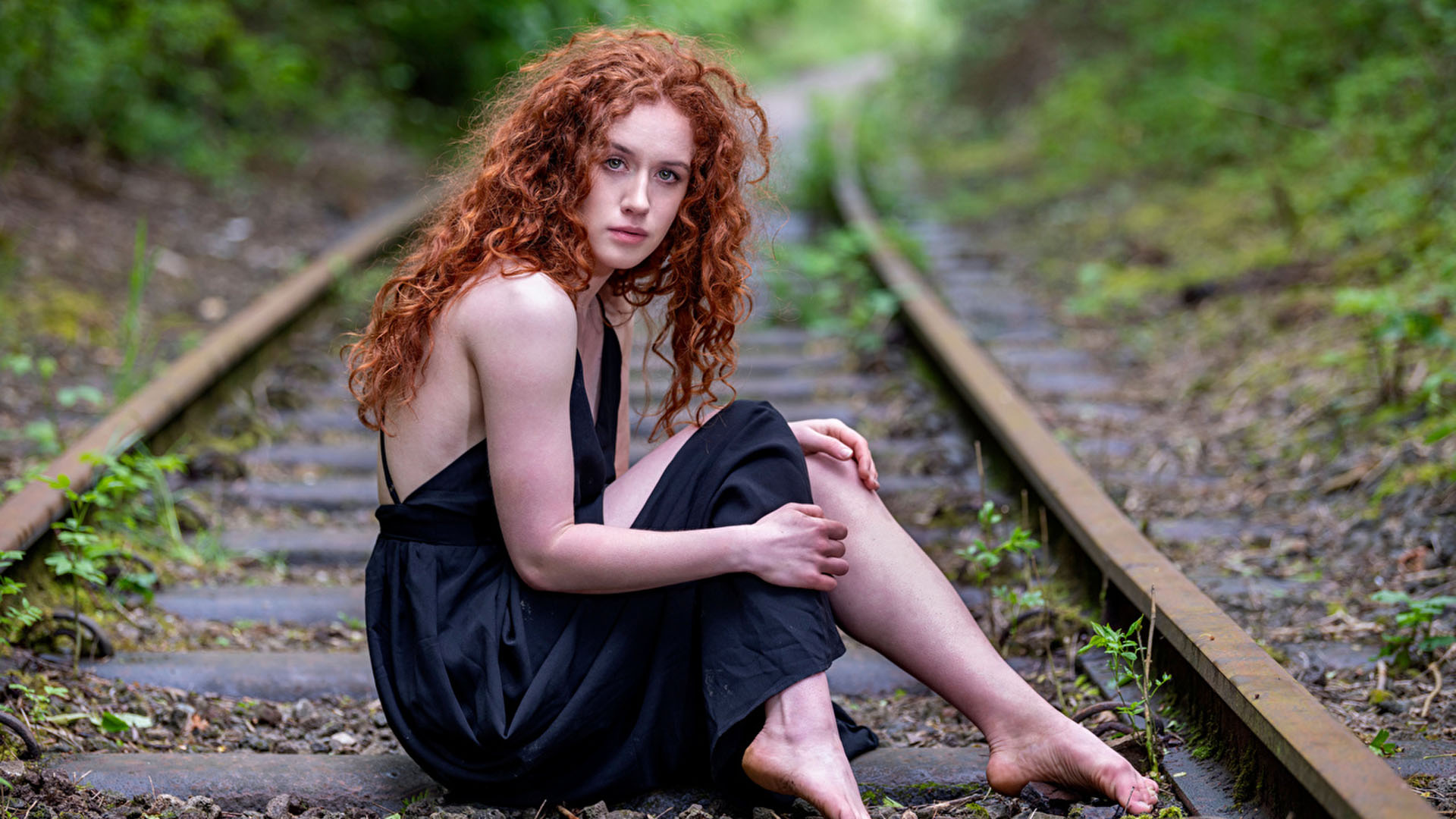 Redhead Curly Hair Girl Model Is Wearing Black Dress Sitting On Railway Track 2K Girls