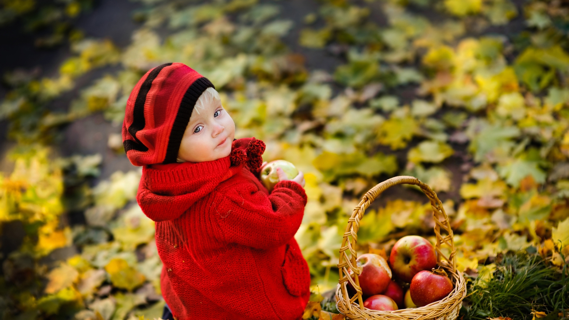Cute Little Boy Is Looking Back Wearing Red Woolen Knitted Dress Having Apple In Hand 2K Cute