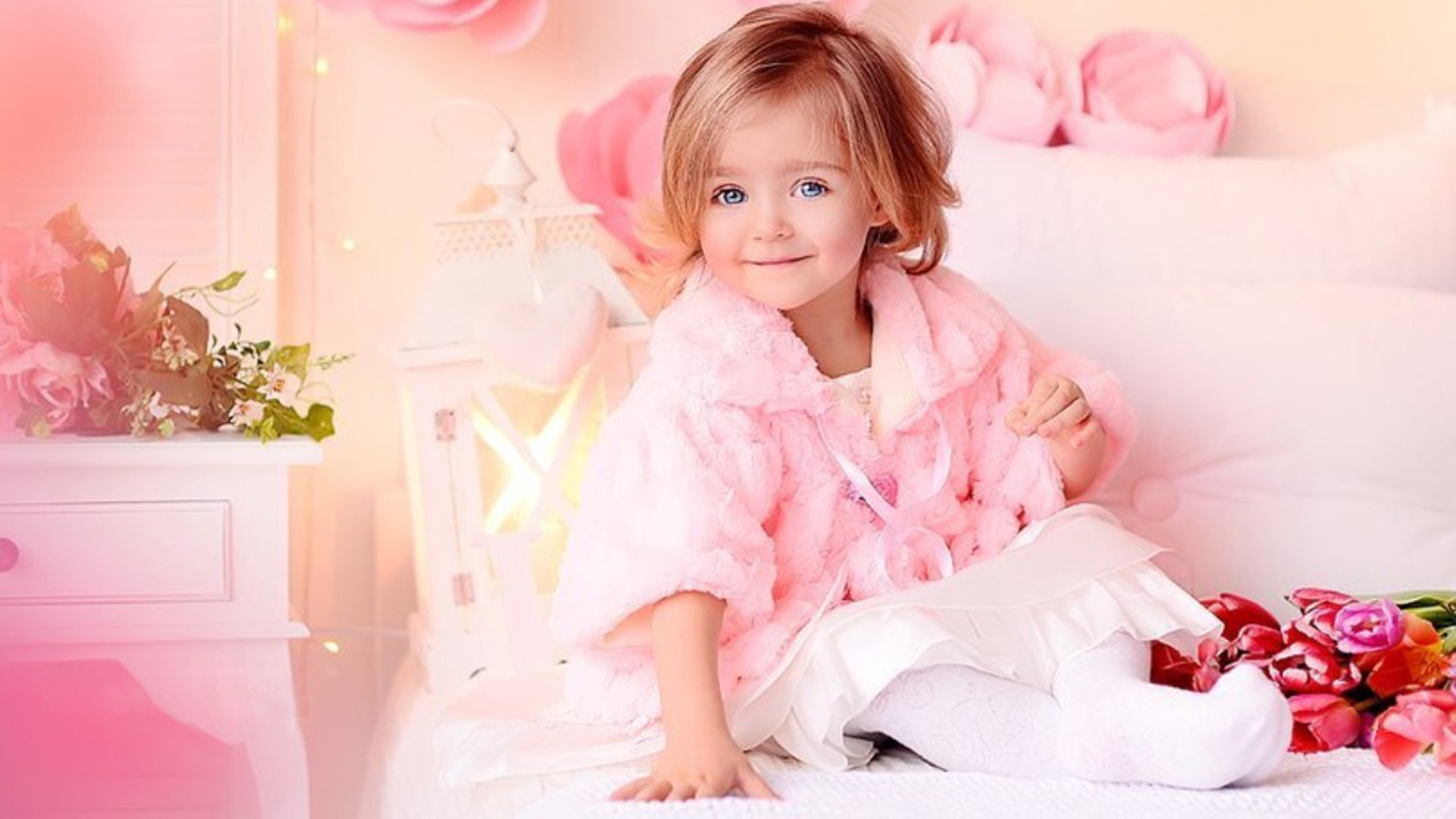 Blue Eyes Cute Little Girl Is Sitting On White Bed Wearing Light Pink Dress 2K Cute