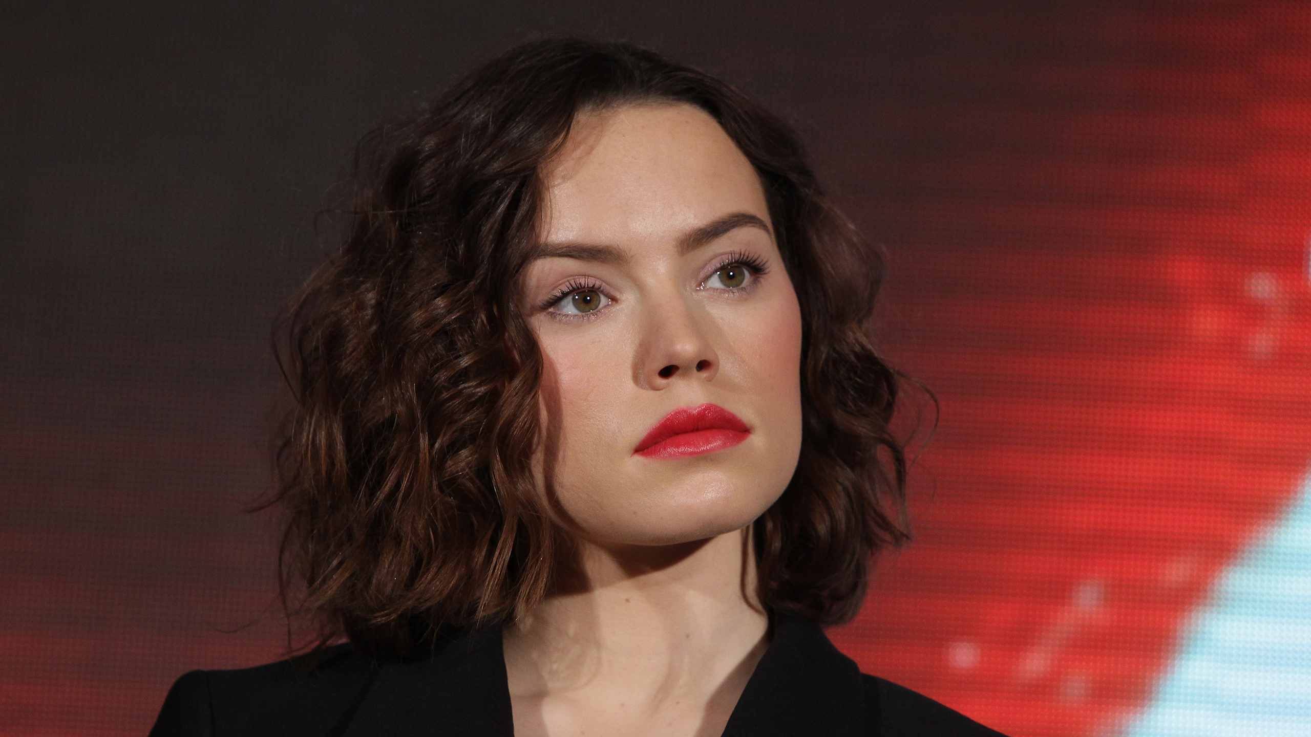 Daisy Ridley With Red Lips In Wallpaper Of Black And Red 2K Daisy Ridley