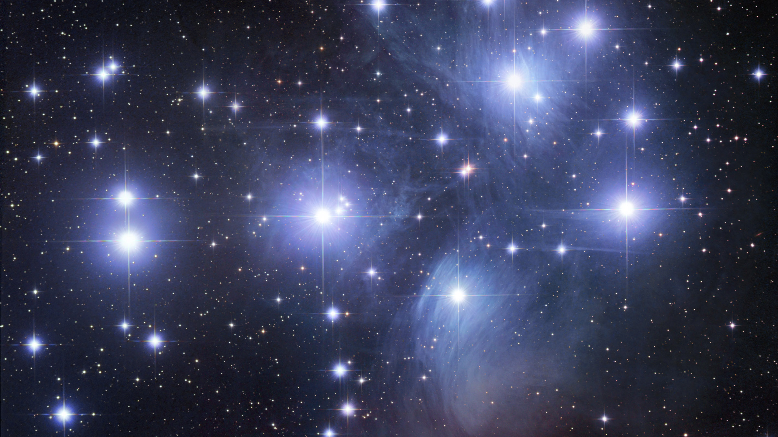 Glittering Blue Stars With Black Sky Wallpaper 2K Space