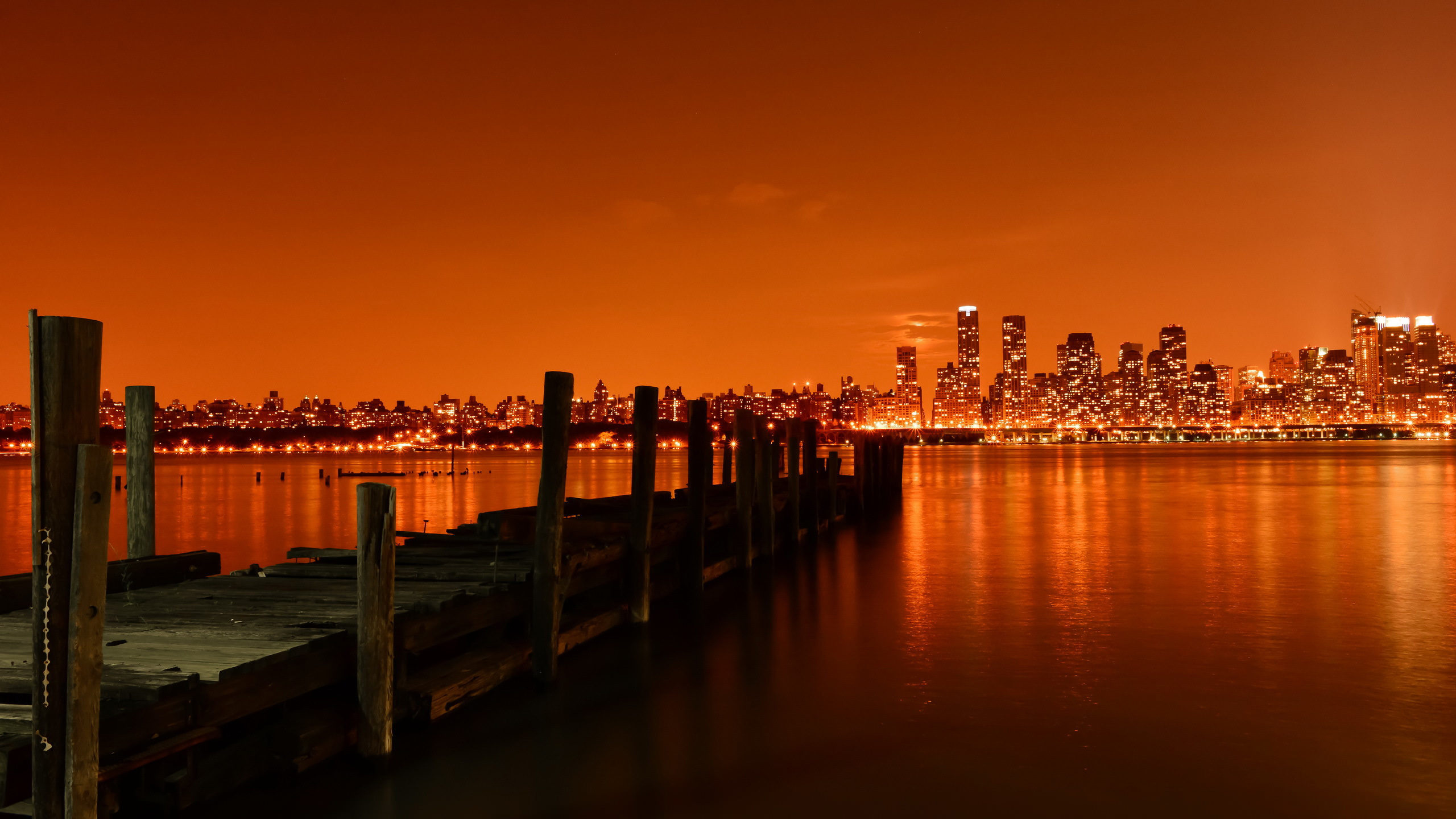 River Pier And New York City With Orange Lightings 2K New York