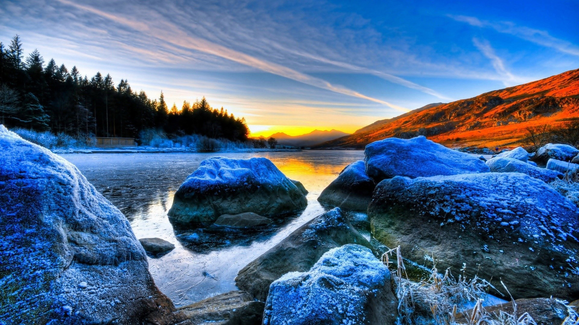 Frozen Rocks On River Landscape View Of Trees In Sunrise Wallpaper Under Blue Sky 2K Nature