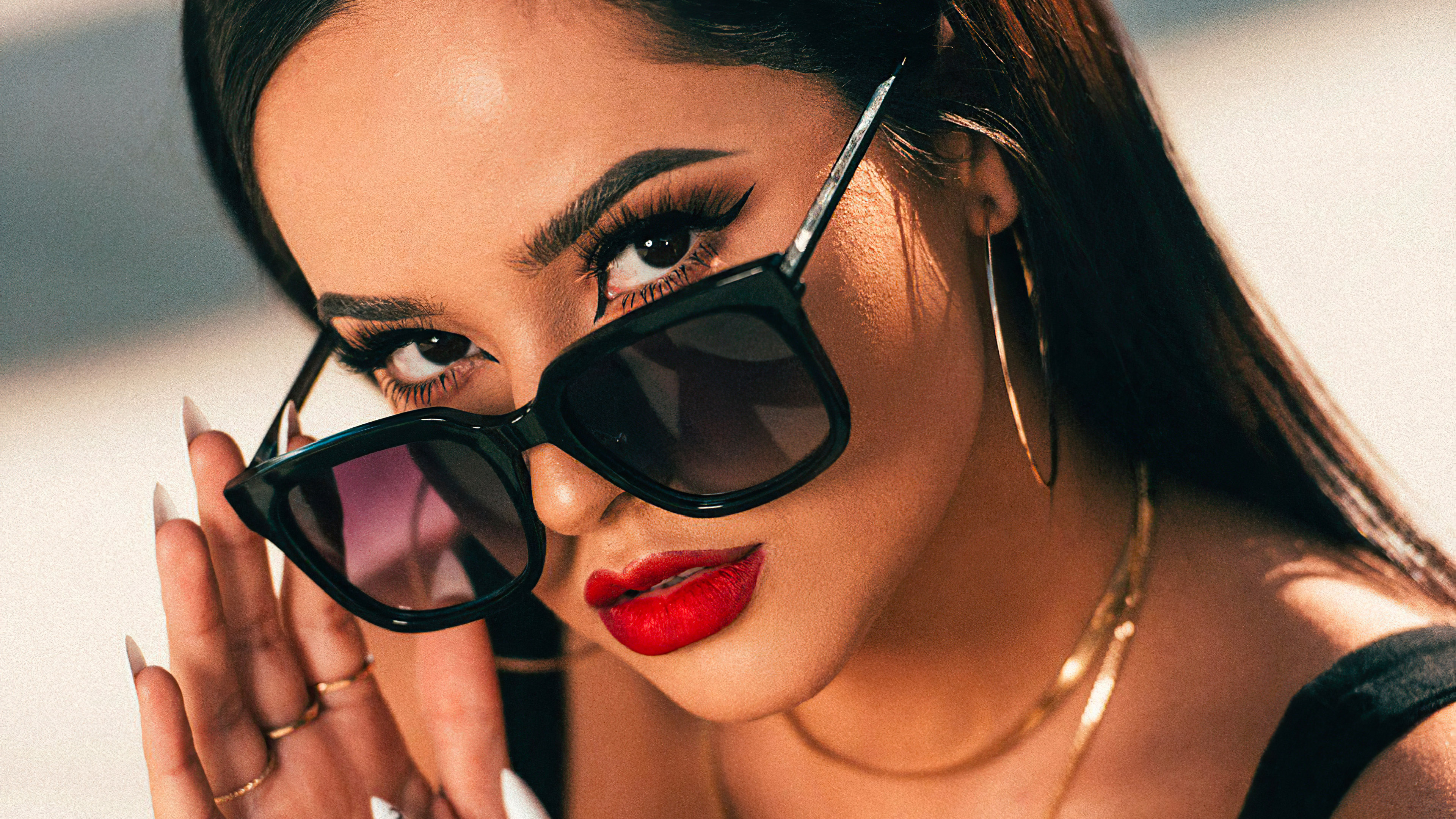 Becky G X Dime Is Holding Sunglasses On Nose And Black Dress With Gold Chains On Neck K 2K Celebrities
