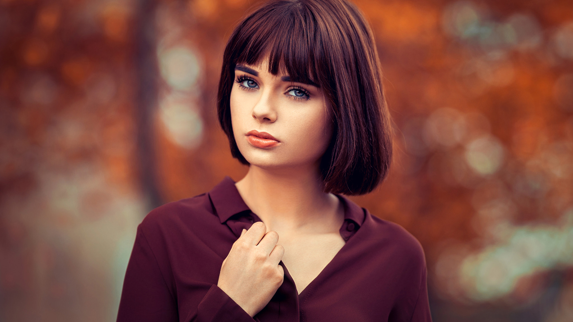 Girl Model With Short Hair Is Wearing A Maroon Shirt 2K Model