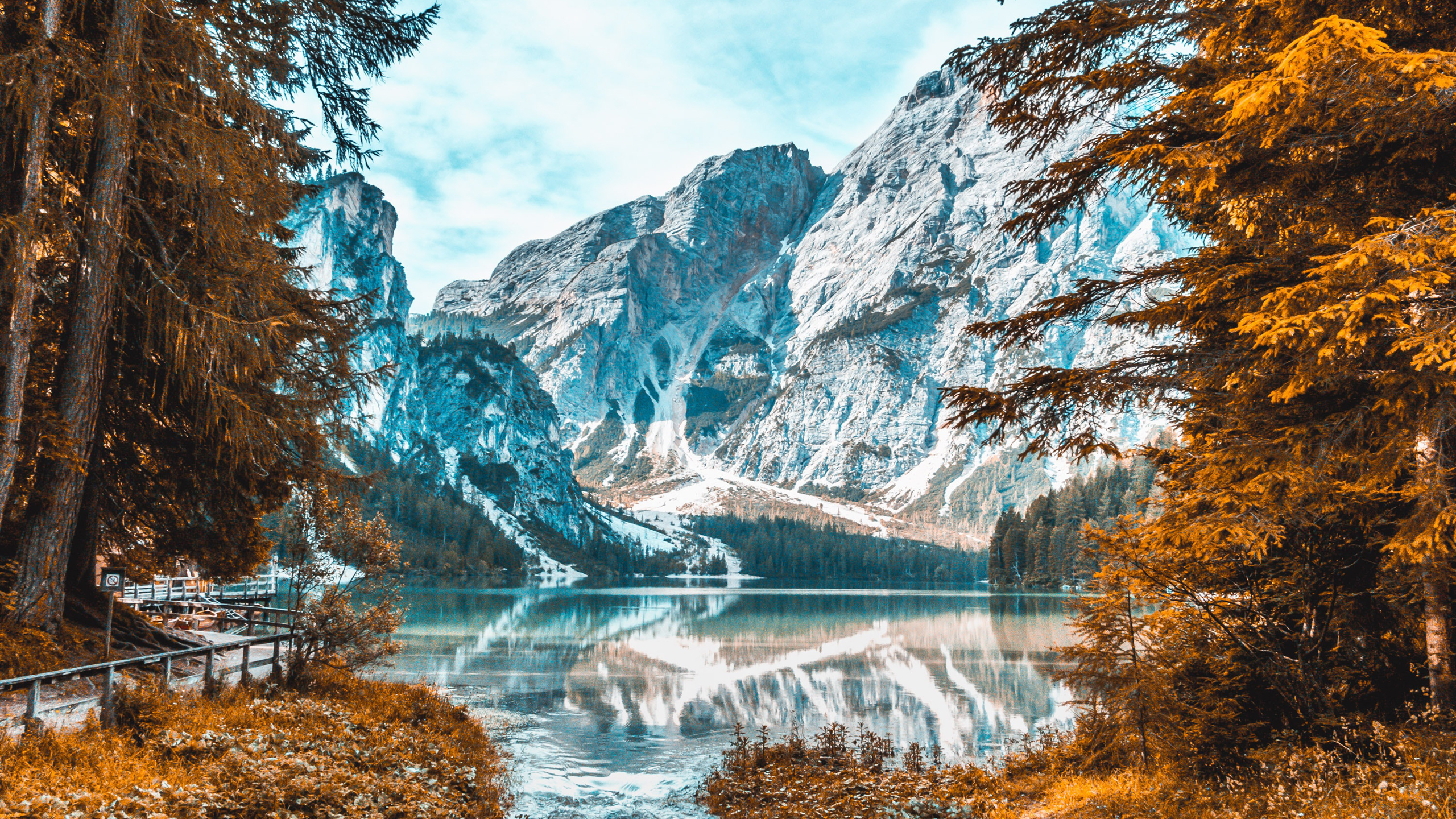 Landscape View Of White Covered Mountains Reflection On River In White Clouds Blue Sky Wallpaper Yellow Autumn Trees 2K Nature